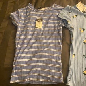 lot of rue21 shirts.
